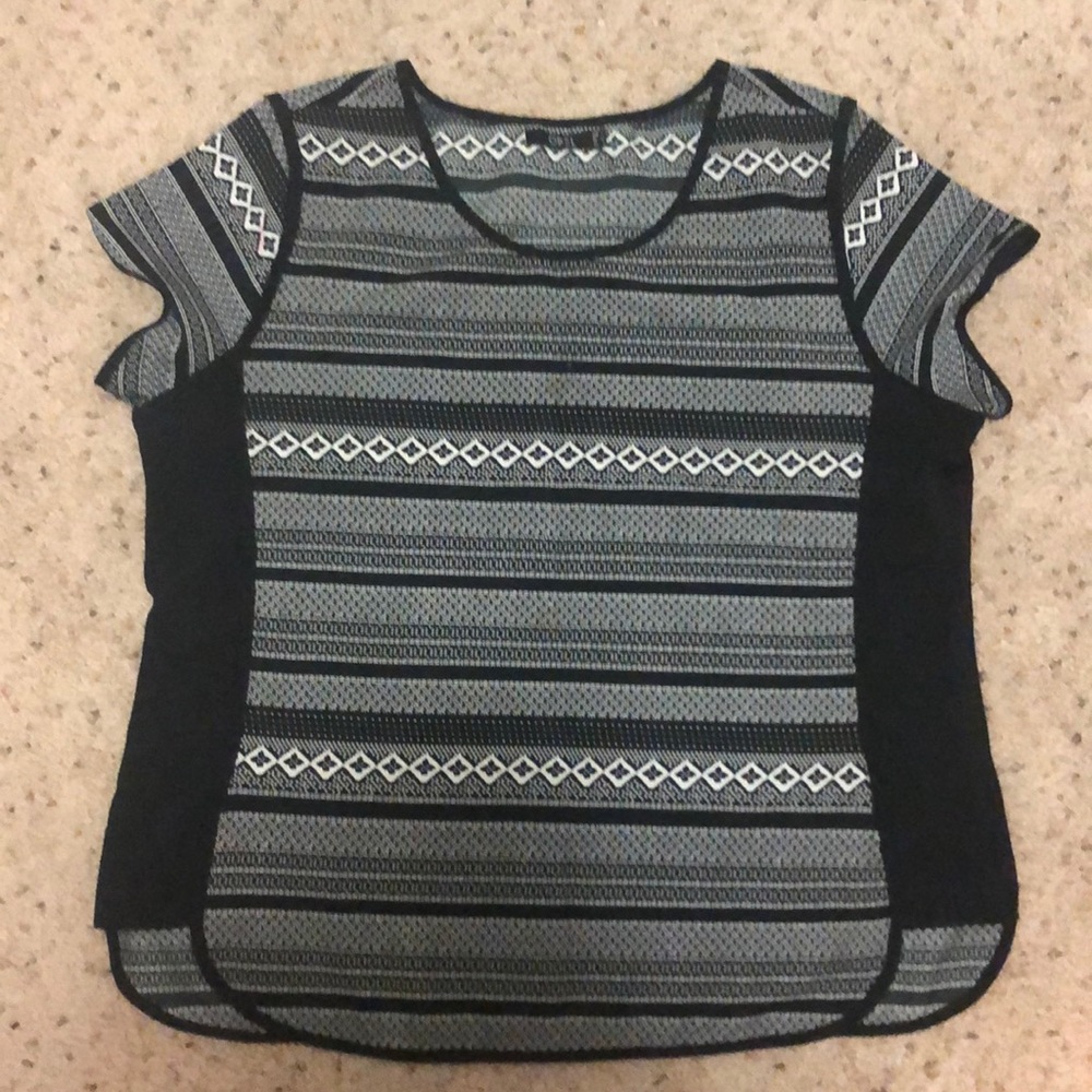 A black and white going out top..